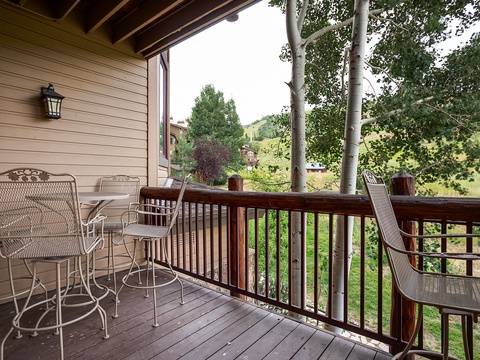 Step onto your private covered balcony, where morning coffee tastes better with mountain and meadow views framed by aspens swaying in the breeze.