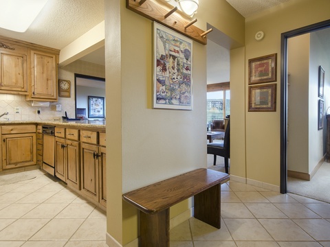 Your fully equipped kitchen awaits, blending warm wood cabinetry with ample counter space and natural light—perfect for easy meal prep and casual gathering.