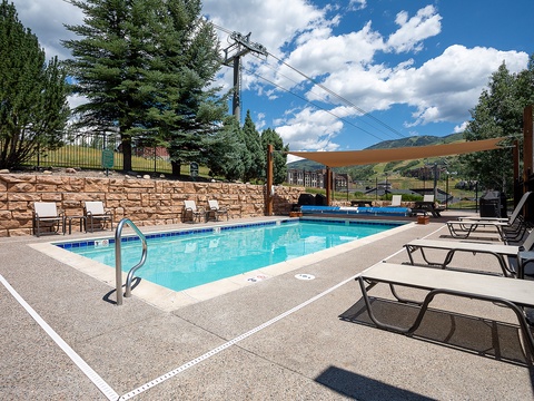 Soak up mountain views while lounging poolside. Cool blue waters invite you to dive in, while comfy chairs let you unwind under the shade after a refreshing swim.