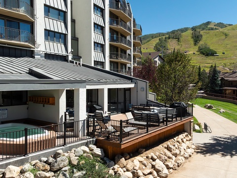 The property sits in a picturesque mountain setting, surrounded by rolling green hills and fresh alpine air—perfect for those seeking a peaceful mountain getaway.
