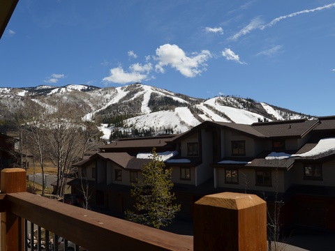 Stunning mountain views with snow-capped peaks frame the property, offering a serene alpine setting in this sought-after ski destination.