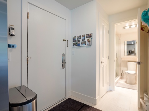 Step into your bright, welcoming space where thoughtful design meets comfort. Personal touches and clean lines create a warm arrival, with your private bathroom just steps away.