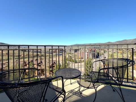 This private balcony offers sweeping views of the surrounding valley and distant mountains—a peaceful spot to enjoy your morning coffee while taking in the desert landscape and nearby community.