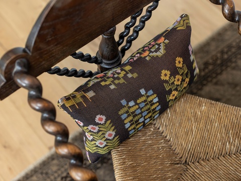 Settle into beautifully crafted antique-style seating with hand-turned wood details and intricate needlepoint cushions that bring timeless charm to your retreat.