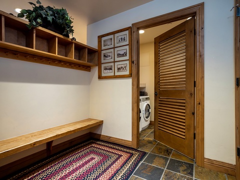 Store your gear in the built-in storage cubbies and keep your clothes fresh with the convenient in-unit washer and dryer tucked behind louvered doors.