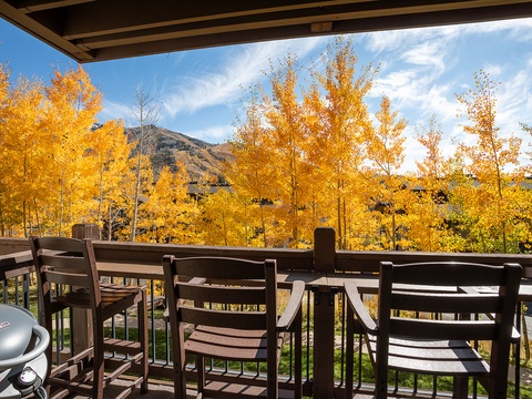 Golden aspens frame your view from this covered balcony, where mountains meet brilliant fall foliage. Perfect for morning coffee or evening grilling while soaking in the season's vibrant colors.