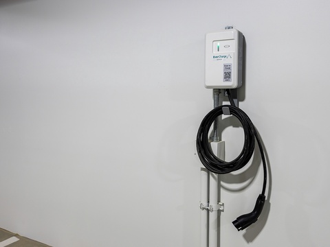 Electric vehicle charging station available on-site for your convenience during your stay.