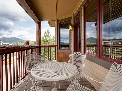 Sip morning coffee on your private balcony while soaking in peaceful mountain views. The cozy outdoor seating offers a perfect retreat to unwind after adventures.