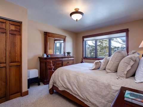 Wake up to breathtaking mountain views through your picture window. Sink into plush bedding surrounded by warm wood tones and unwind in this serene retreat after a day of adventure.