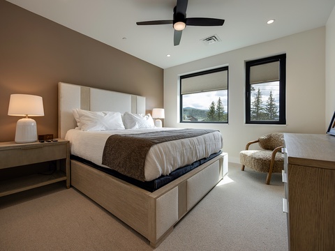 Wake up to mountain views framed by your bedroom windows. Fresh linens, soothing tones, and a cozy reading nook invite you to unwind in style.