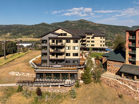 The property is nestled in a mountain valley with stunning natural scenery, offering a peaceful retreat surrounded by breathtaking peaks and open skies.