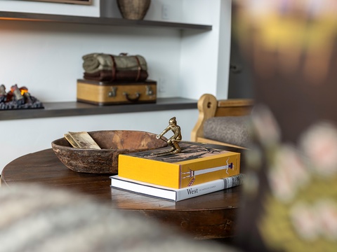 Your living space features carefully curated décor and vintage-inspired touches, inviting you to relax in a home filled with character and thoughtful design.