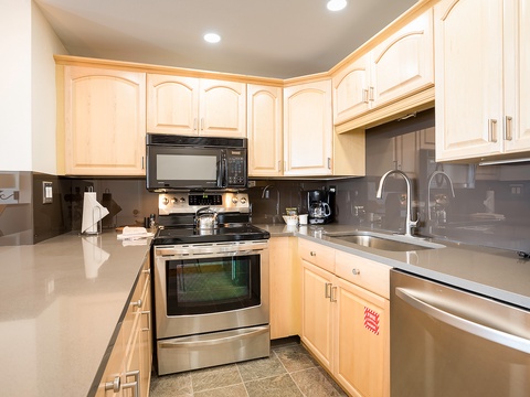 Your fully equipped kitchen features modern stainless steel appliances, ample counter space, and everything you need to prepare your favorite meals in comfort.