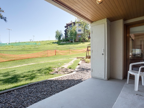 Step onto your private patio and soak in open lawn views, perfect for morning coffee or unwinding after a day of exploring nearby attractions.