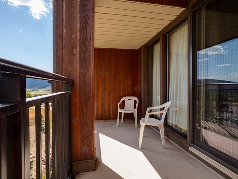 Sit back on your private balcony with sweeping mountain views and warm sunshine, a perfect spot for morning coffee or evening relaxation framed by natural beauty.