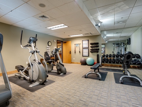 Stay active during your getaway in a well-equipped fitness center featuring cardio machines, free weights, and yoga accessories—perfect for maintaining your workout routine while traveling.