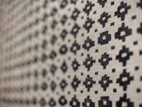 Beautifully patterned textiles add visual interest and a touch of handcrafted charm to your space, making it feel cozy and thoughtfully designed.
