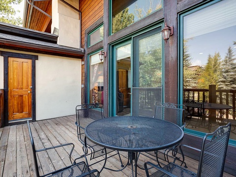 Enjoy morning coffee or evening cocktails on your private deck, with a spacious table perfect for meals, relaxing views, and plenty of fresh mountain air.