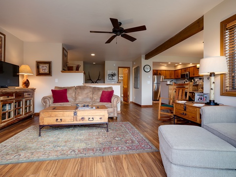 Step into your cozy mountain retreat with warm wood accents, rustic furnishings, and an open layout that blends living and dining spaces, creating the perfect home base for your getaway.
