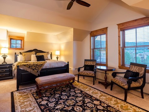 Sink into your plush bed after a day of exploring, or curl up in the cozy seating area with a book. Warm lighting and elegant touches create your perfect retreat.