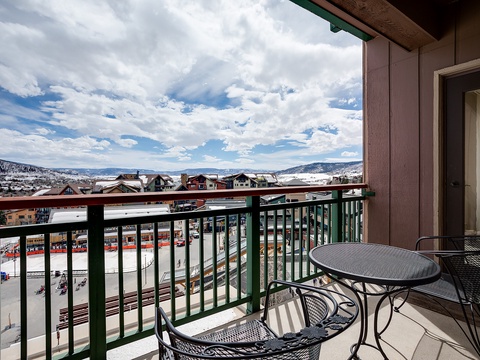 Mountain vistas stretch before you from this private balcony, where morning coffee meets snowy peaks and dramatic skies. Winter wonderland views frame your alpine escape perfectly.