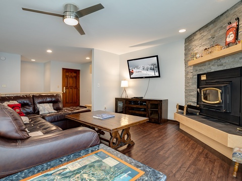Sink into the plush leather couch and let your worries melt away by the cozy stone fireplace. Rich hardwood floors and thoughtful mountain-inspired touches create the perfect retreat after your adventures.