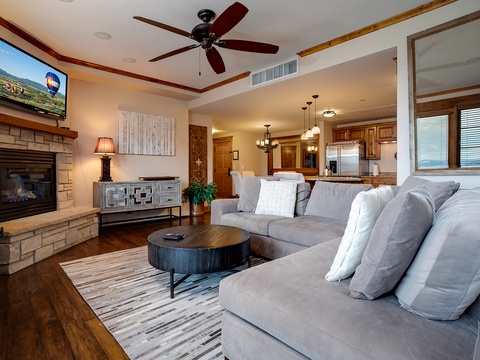 Sink into plush seating by your private fireplace, with a full kitchen and entertainment just steps away—your perfect retreat after a day of adventure.