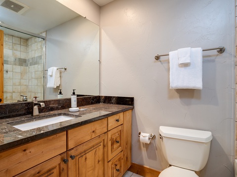Refresh after your day's adventures in your private bathroom, complete with a walk-in shower, plush towels, and a stylish vanity with ample storage.