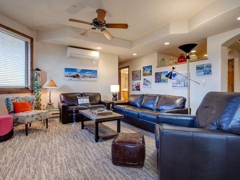 Sink into plush leather sofas where your group can gather, share stories, and plan tomorrow's adventures in this bright, welcoming living space designed for togetherness.