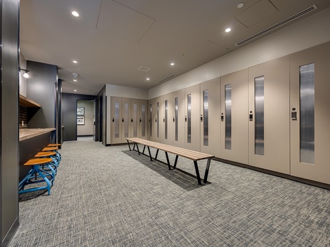 Secure your gear in dedicated lockers and prep for the day with bench seating in this well-lit storage area designed with convenience in mind.