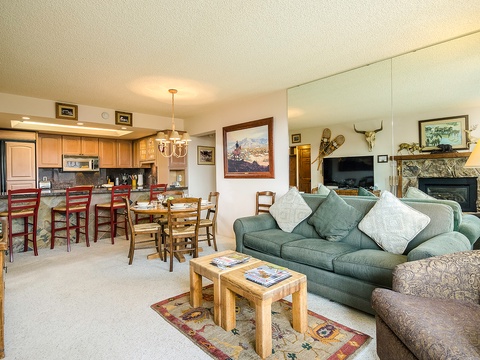 Settle into your spacious, open-plan retreat where rustic charm meets mountain comfort. Gather by the stone fireplace, cook in your fully equipped kitchen, and make memories around the cozy dining table.