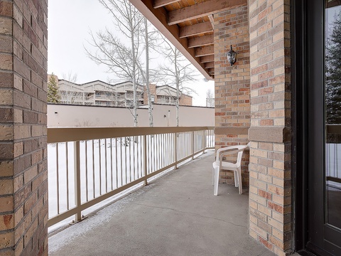 Your private balcony offers a peaceful spot to relax and enjoy fresh mountain air, with seating ready for your morning coffee or evening unwind.