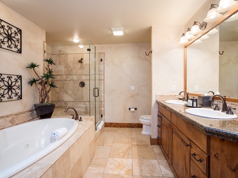 Unwind in your spa-inspired bathroom with a relaxing jetted tub, walk-in shower, and elegant double vanity—your private retreat awaits.