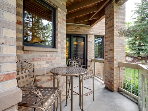 Enjoy your morning coffee on this private balcony, where lush greenery and peaceful surroundings create the perfect spot to relax and breathe in the fresh air.