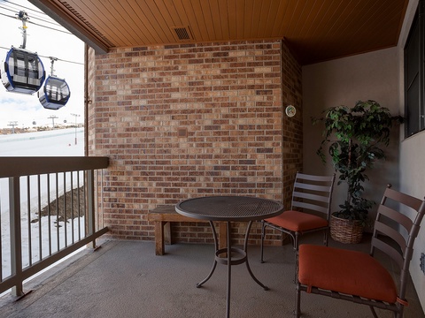 Relax on your private balcony with mountain views and nearby ski lift access, perfect for enjoying crisp mornings before hitting the slopes or unwinding after a day of adventure.
