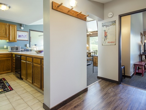 Step into your welcoming mountain retreat, where a fully-equipped kitchen awaits your culinary adventures and cozy living spaces invite you to unwind after exploring the slopes.