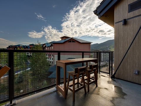 Your private balcony offers a serene spot to sip morning coffee or unwind with evening drinks, with mountain views and open skies creating a peaceful retreat.