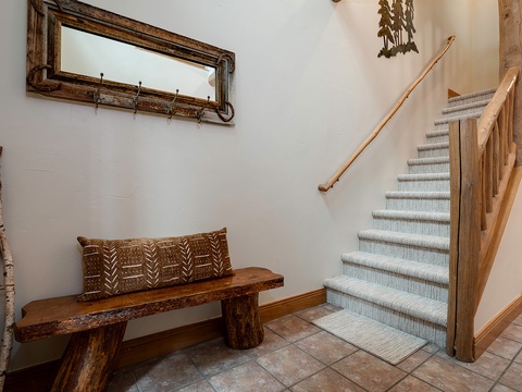 Step inside to find a warm, inviting entryway with rustic charm and natural wood details that set the tone for your mountain retreat.
