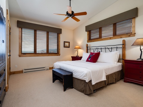Unwind in your spacious bedroom with a plush bed, warm rustic touches, and plenty of natural light to help you feel instantly at home.