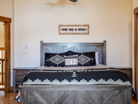 Sink into crisp linens and rustic charm. Your private retreat features a handcrafted wooden bed and warm touches that make unwinding effortless after a day of adventure.