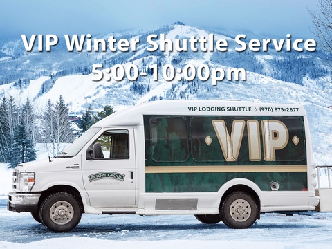 A VIP shuttle service stands ready in a snowy mountain resort area during the winter season, providing convenient transport to nearby ski slopes.