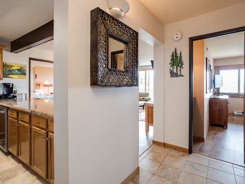 A welcoming entryway connects your fully-equipped kitchen, cozy living spaces, and private bedrooms—flowing together effortlessly for your mountain getaway.