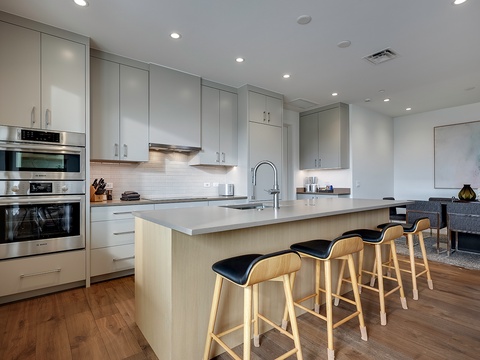 Step into your sleek, open kitchen where every detail is designed for your comfort—modern appliances, clean lines, and a spacious island where you can sip your morning coffee or gather for a relaxed meal. Light, airy, and effortlessly stylish.