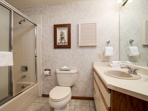 Your private bathroom features a full tub-shower combo, fresh towels, and everything you need to refresh after your adventures.