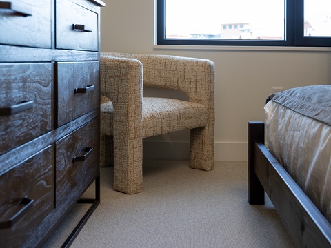 Settle into your cozy reading nook by the window, where natural light and a plush armchair create the perfect spot to unwind after a day of exploring.