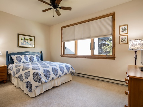 Sink into this cozy bedroom with a plush queen bed, warm lighting, and mountain views through your private window. Fresh linens and peaceful decor create your perfect retreat after a day of adventure.