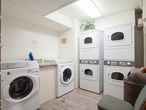 A well-equipped shared laundry room with multiple washers and dryers makes it easy to refresh your wardrobe during your stay.