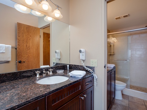 Your private bathroom features granite countertops, fresh towels, and modern amenities, making it easy to settle in and feel at home during your stay.