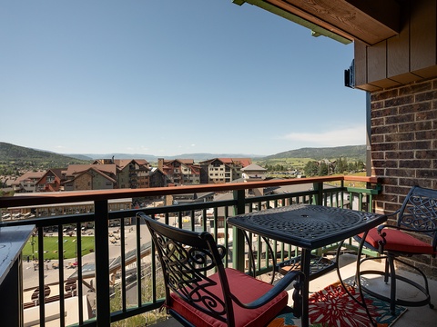 Sip your morning coffee at this mountain-view balcony, where rolling hills frame the quiet neighborhood below and invite peaceful starts to your day.