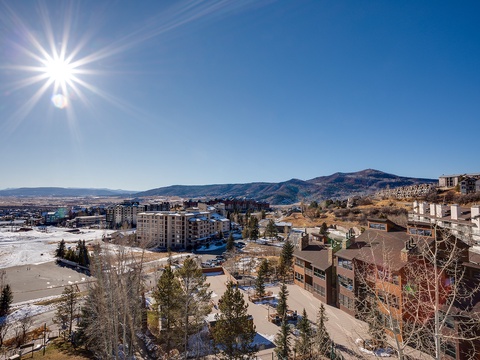 Stunning mountain valley setting showcasing the property's prime location near scenic peaks and recreational areas, with expansive views across the surrounding community.